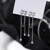 Silver Post Bow Tassel Earrings