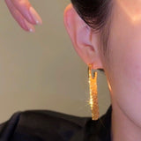 14K Gold-plated G-Word Tassel Earrings