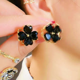 Silver Post Black Rotating Flower Stud Earrings