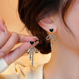 Silver Post Diamond Love Bow Earrings