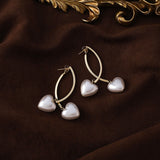 Silver Post Heart Shape Pearl Cross Earrings