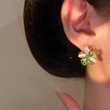 Silver Post Rotating Flower Stud Earrings