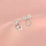 Sterling Silver Asymmetric Bow Earrings