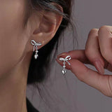 Sterling Silver Bow And Heart Earrings