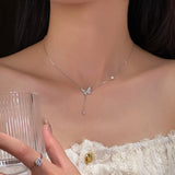 Sterling Silver Diamond Butterfly Synthetic Pearl Necklaces