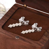 Sterling Silver Elegant Bow And Pearl Earrings