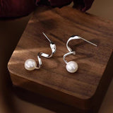 Sterling Silver Elegant Curved Pearl Earrings