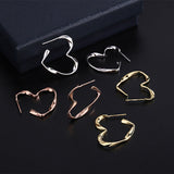 Sterling Silver Elegant Hollow Love Heart Earrings