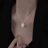 Sterling Silver Elegant Pearl Bow Necklaces