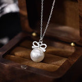 Sterling Silver Elegant Pearl Bow Necklaces