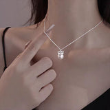 Sterling Silver Elegant Pearl Bow Necklaces