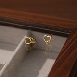 Sterling Silver Hollow Heart-Design Earrings