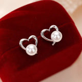 Sterling Silver Hollow Love Heart Pearl Stud Earrings